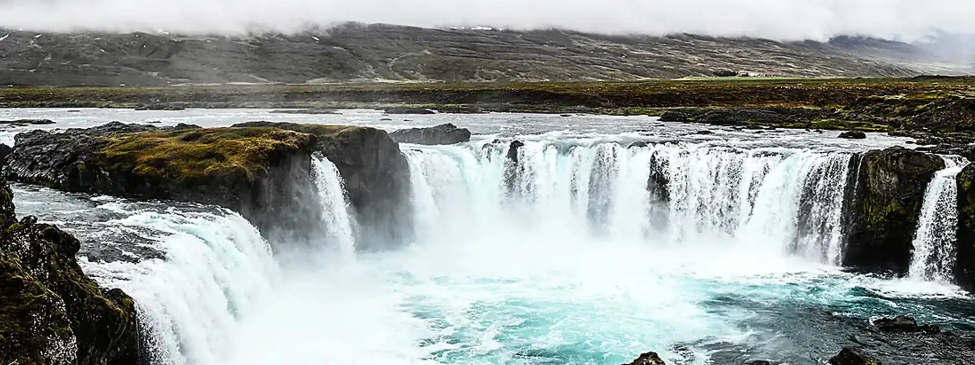 PONANT ICELAND CRUISE DEALS slider waterfall